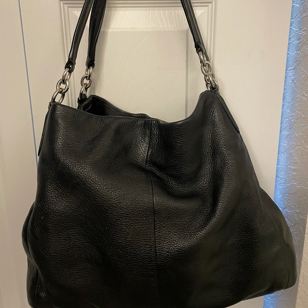 Black leather Coach shoulder bag.